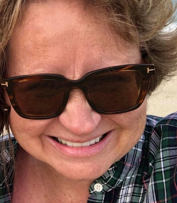 Portrait of Deb Goetz, Realtor®, CRS, Broker/Owner.